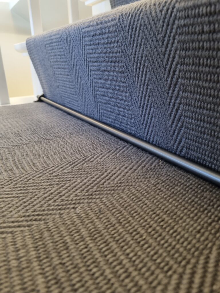 Detalj av trappeløper kant og finish